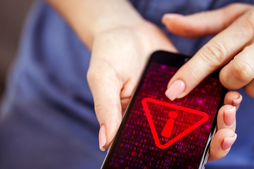 mobile-phone-showing-red-alert-notification-screen-